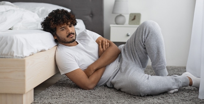 young east indian guy looking sad