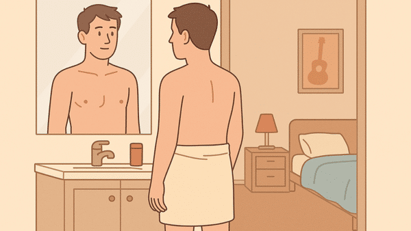 inline guy looking in mirror after shower