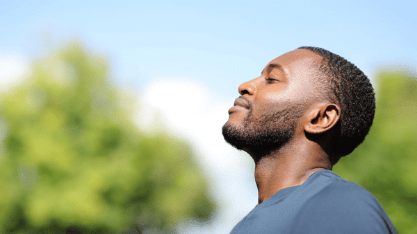 man looking up content